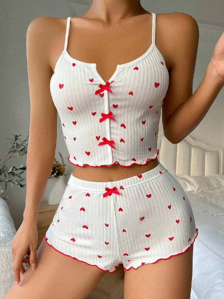 Ropa de dormir Sexy para mujer, conjunto de pijamas con estampado de corazón de seda, cuello en V, sin mangas, camisola informal, conjuntos de Top y pantalones cortos, traje para casa, ropa de descanso