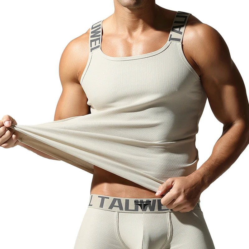 Camisetas sin mangas a la moda para hombre, chaleco deportivo de entrenamiento sin mangas, camisolas acanaladas con tirantes elásticos de Color sólido, camisetas interiores ajustadas