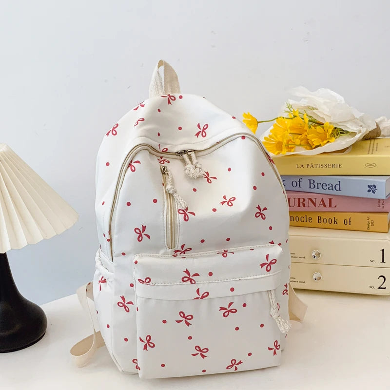 Para uso diario, temporada de regreso a la escuela, mochila acolchada con estampado de lazos divertidos, con múltiples bolsillos, correas ajustables, gran capacidad