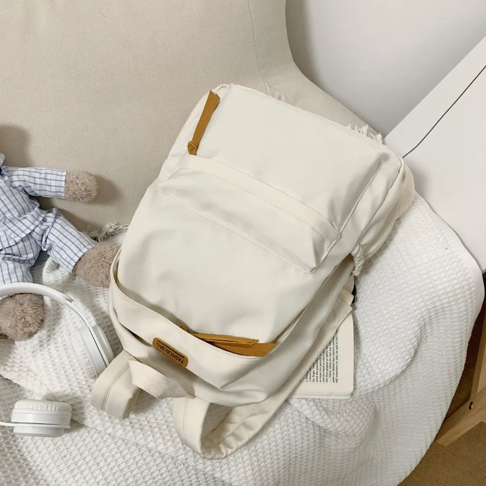 Mochila escolar de gran capacidad, mochila escolar con cremallera de color sólido para estudiantes universitarios, mochilas de compras de estilo sencillo, versión coreana