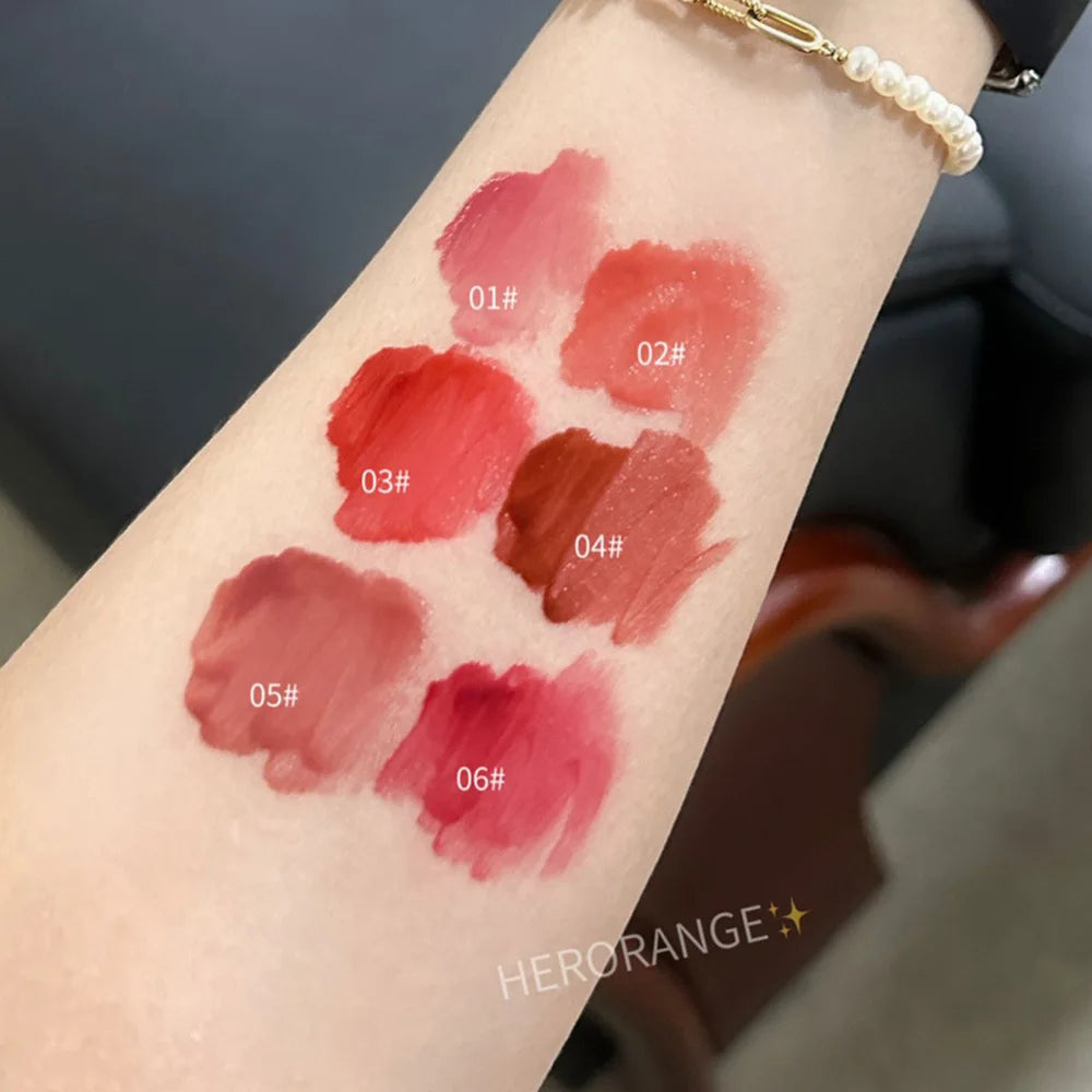 Brillo de agua de vidrio ligeramente, esmalte de labios Herorange, espejo hidratante, labios regordetes, no es fácil de pegar en la taza, maquillaje de larga duración