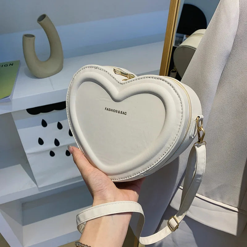 Gran oferta de bolsos cruzados con forma de corazón para mujer, bandoleras de piel sintética sólidas, bolsos de moda