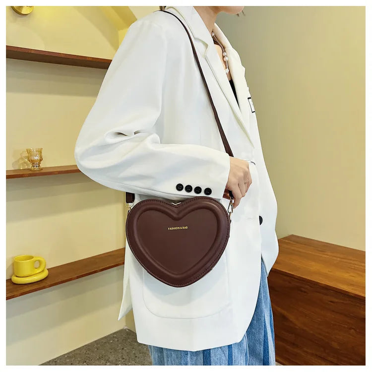 Gran oferta de bolsos cruzados con forma de corazón para mujer, bandoleras de piel sintética sólidas, bolsos de moda