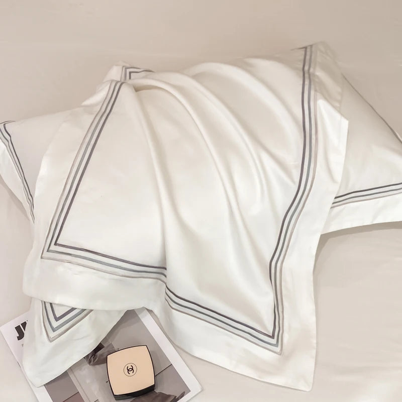Juego de ropa de cama de lujo para Hotel, funda de edredón con bordado de Color sólido, Sábana plana/ajustada, fundas de almohada, tamaño Queen y King, 100% algodón
