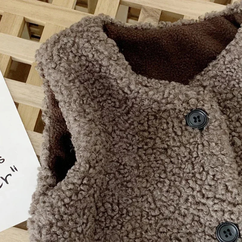 Otoño Invierno bebé lana de cordero más chaleco de terciopelo niñas niños chaleco de felpa de un solo pecho cuello en V niño cálido moda abrigo cálido