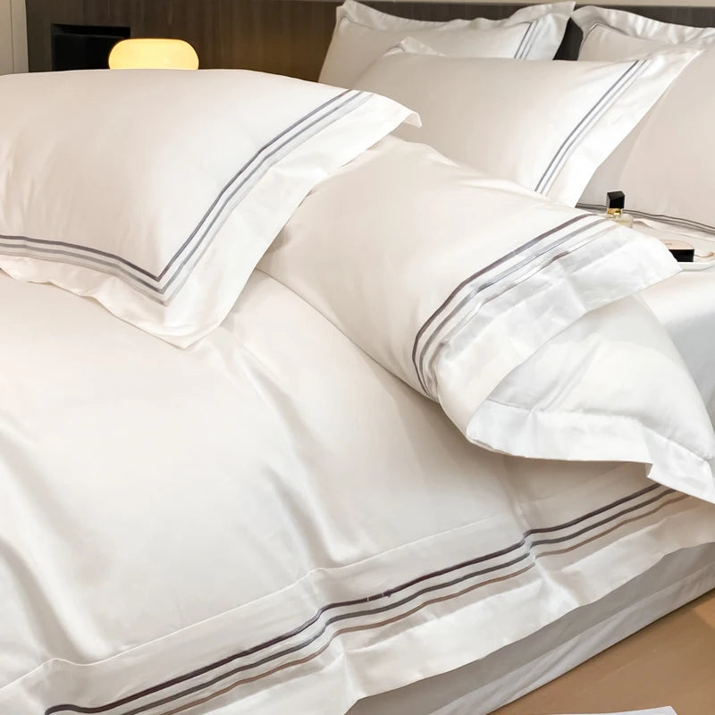 Juego de ropa de cama de lujo para Hotel, funda de edredón con bordado de Color sólido, Sábana plana/ajustada, fundas de almohada, tamaño Queen y King, 100% algodón