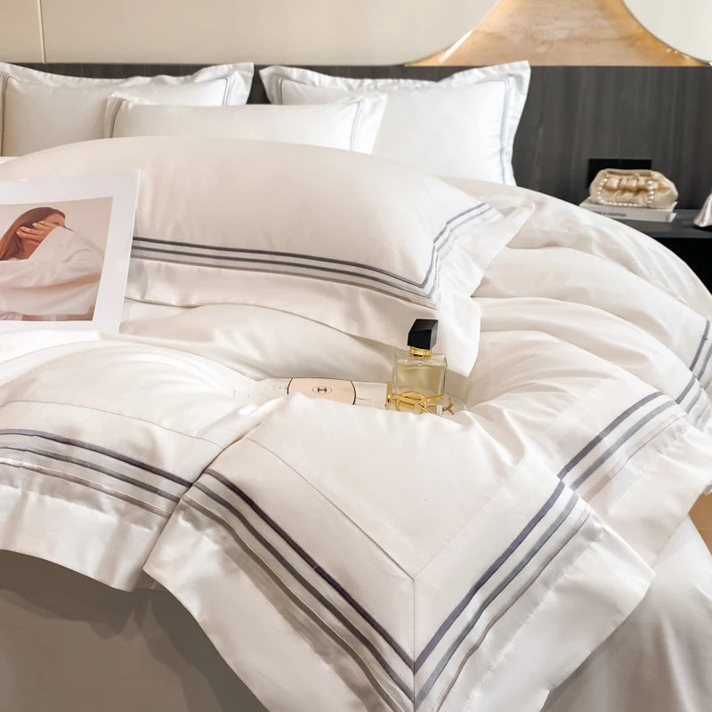 Juego de ropa de cama de lujo para Hotel, funda de edredón con bordado de Color sólido, Sábana plana/ajustada, fundas de almohada, tamaño Queen y King, 100% algodón