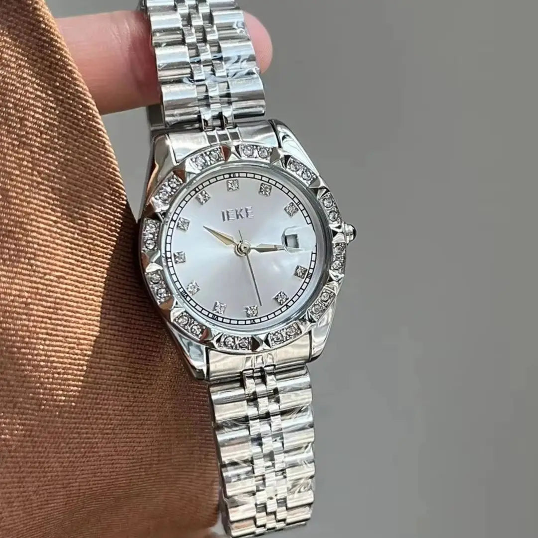 Reloj con banda de acero de aleación sólida con acento de cristal para mujer, elegante vestido, relojes con calendario de cuarzo para mujer