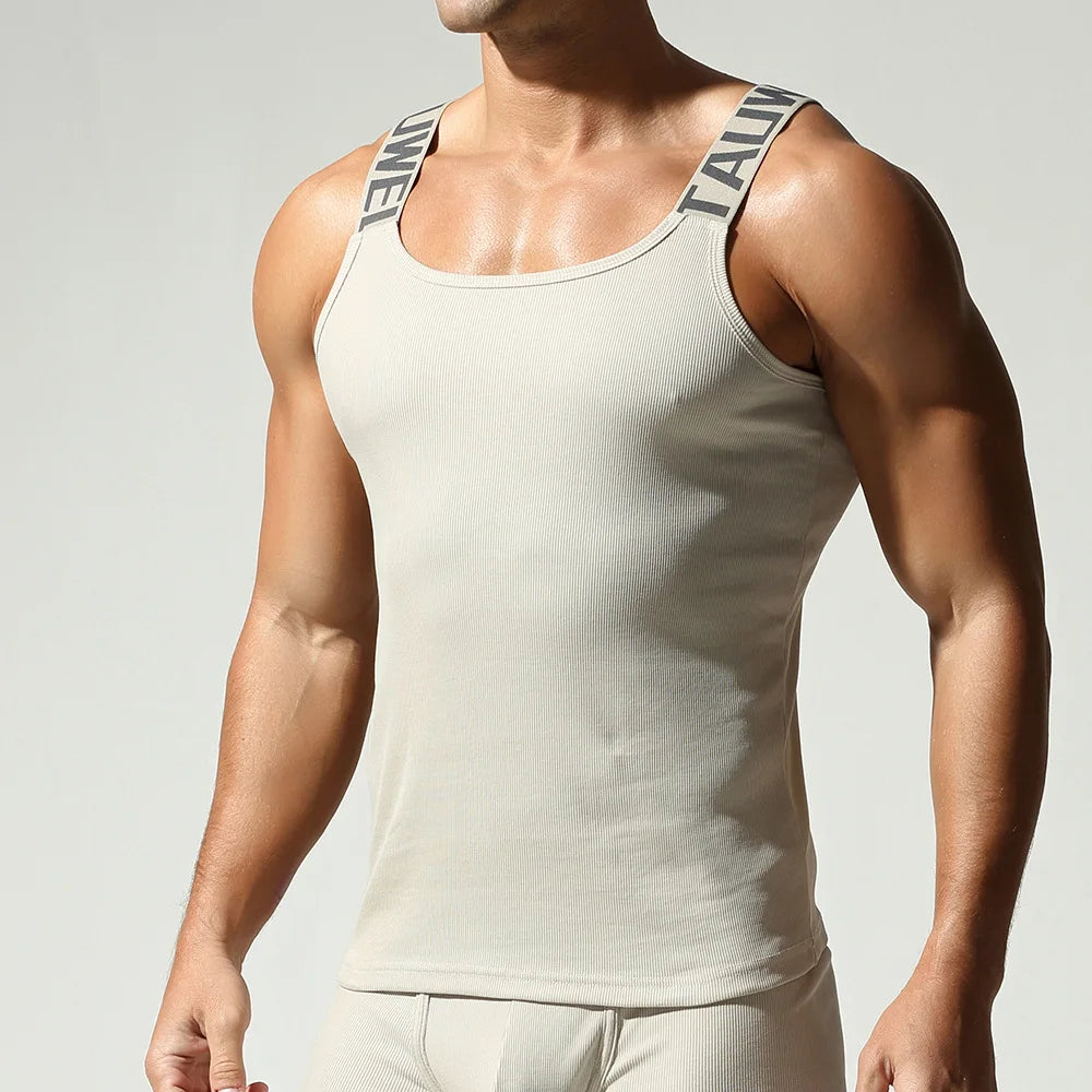 Camisetas sin mangas a la moda para hombre, chaleco deportivo de entrenamiento sin mangas, camisolas acanaladas con tirantes elásticos de Color sólido, camisetas interiores ajustadas