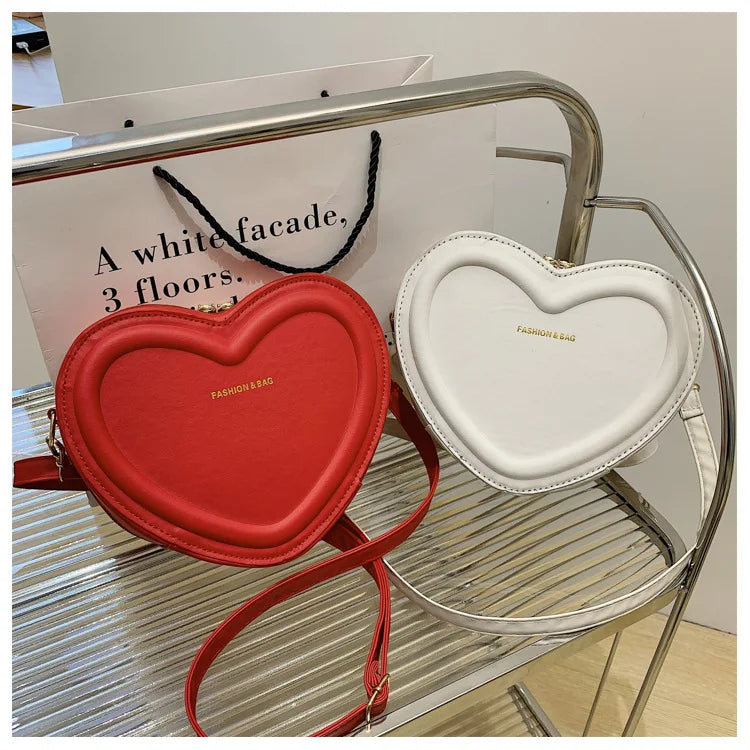 Gran oferta de bolsos cruzados con forma de corazón para mujer, bandoleras de piel sintética sólidas, bolsos de moda