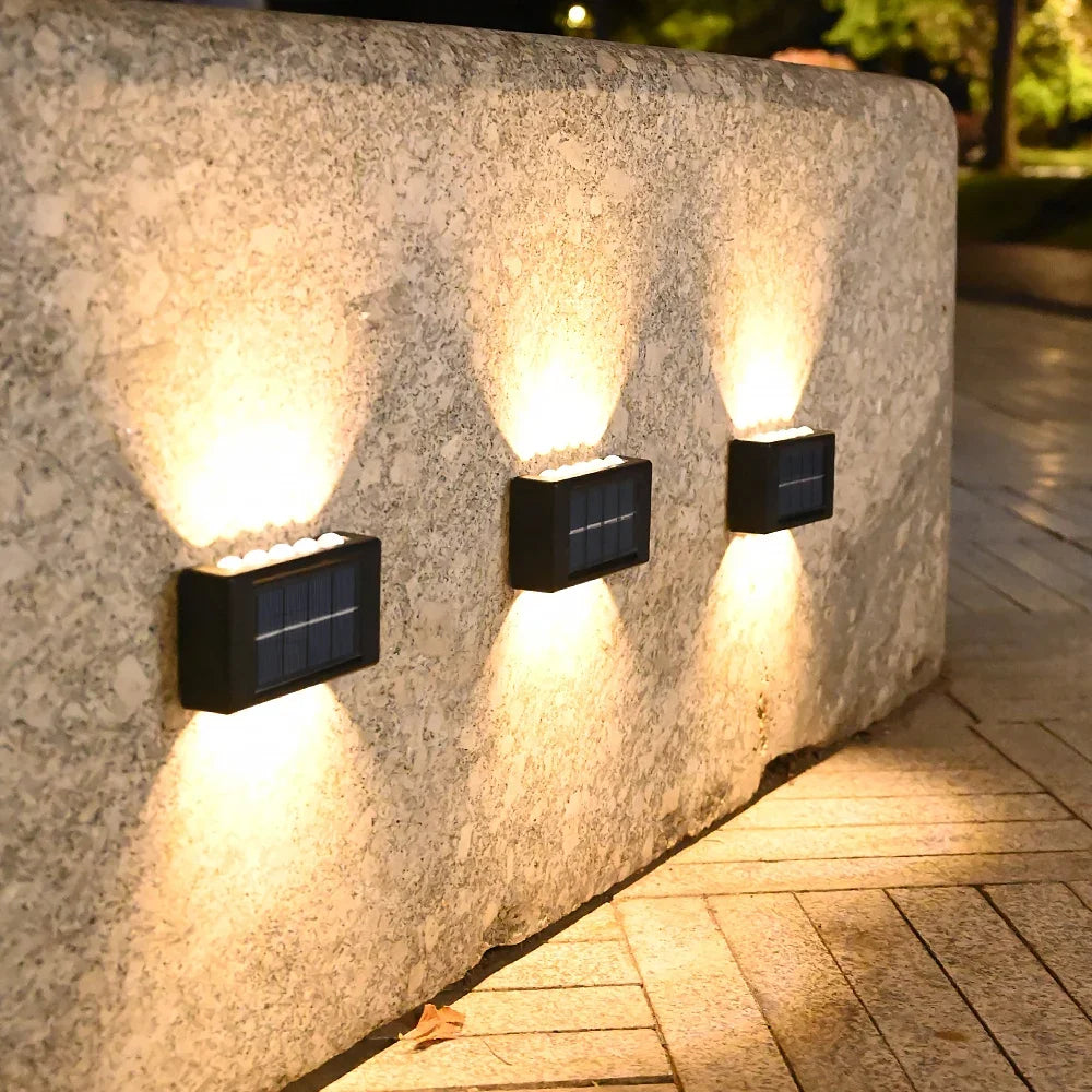Lámpara Solar de pared para exteriores, luz cálida, impermeable, iluminación luminosa arriba y abajo, luces decorativas para balcón, patio y jardín, pared Exterior