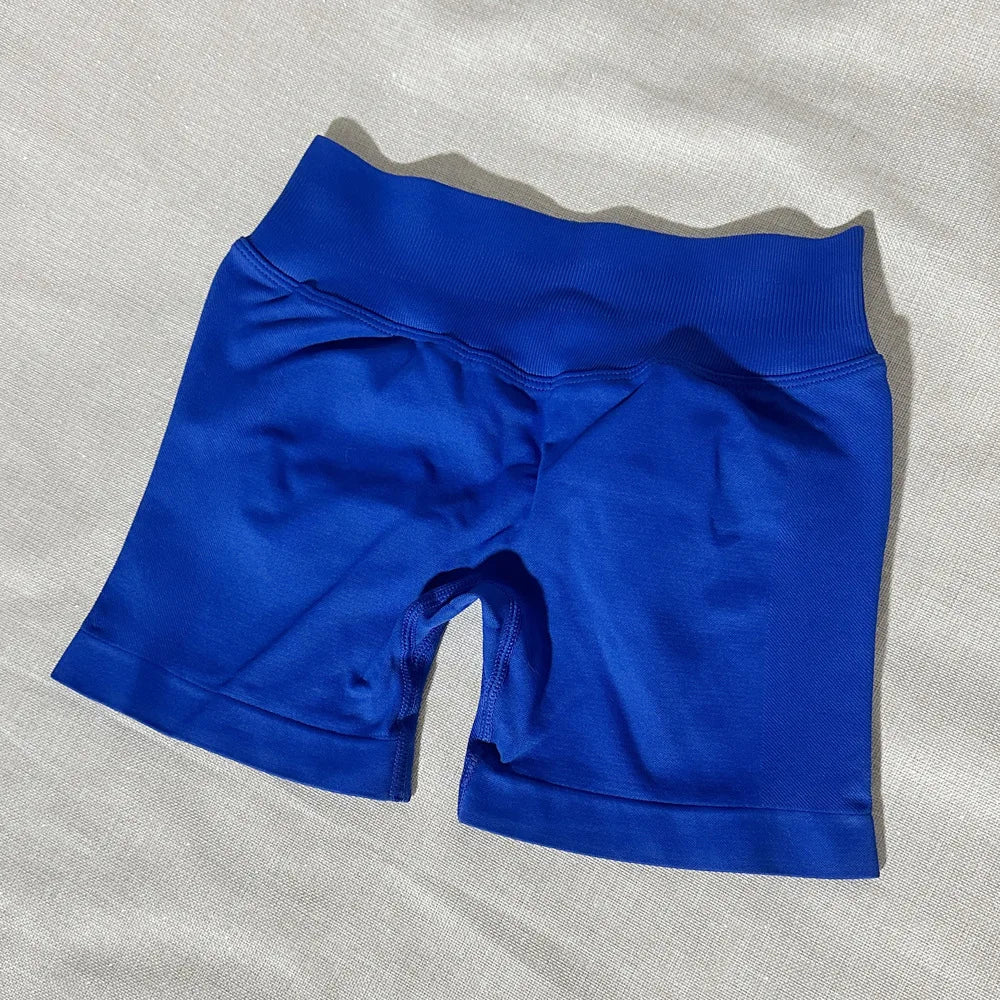 Pantalones cortos deportivos para mujer, pantalones cortos de gimnasio con banda baja acanalada de 4,5 ", mallas sin costuras para entrenamiento y Yoga