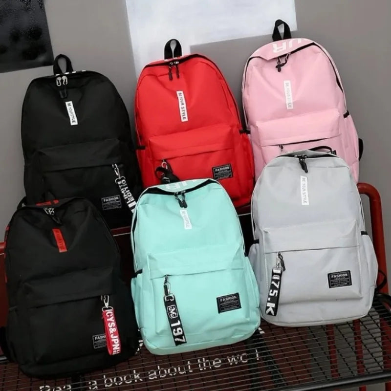 Mochila de tendencia de moda para hombres y mujeres, bolsa para estudiantes de secundaria, gran capacidad, versión coreana de th