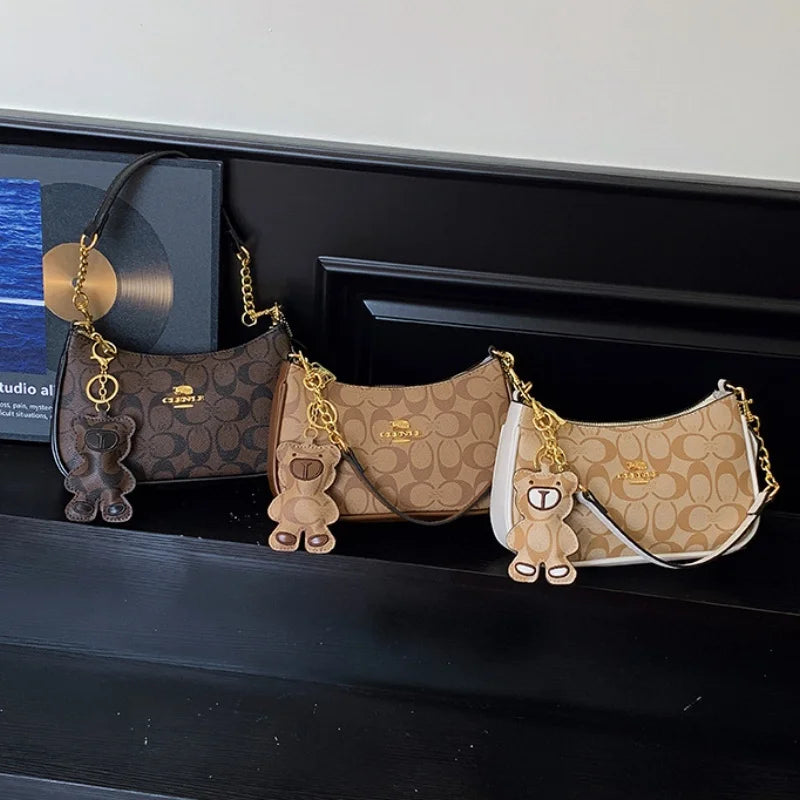 Bolso de mano de estilo de alta gama para mujer, nuevo modelo 2025, bolso cuadrado pequeño único y moderno, moderno, retro, simple y elegante, cr