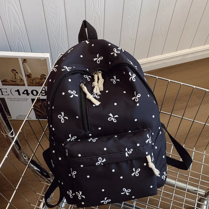 Para uso diario, temporada de regreso a la escuela, mochila acolchada con estampado de lazos divertidos, con múltiples bolsillos, correas ajustables, gran capacidad