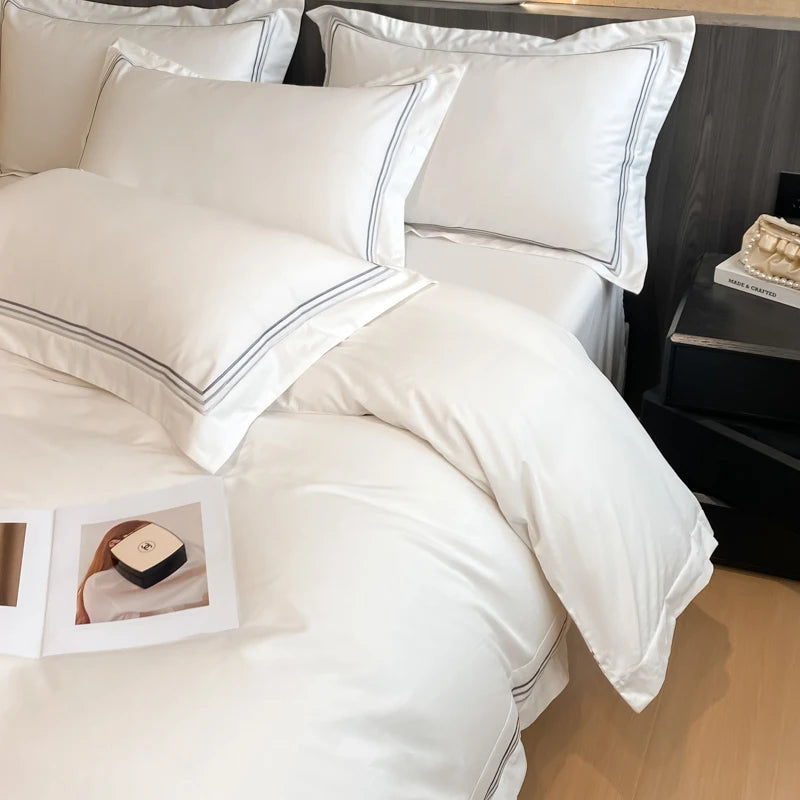 Juego de ropa de cama de lujo para Hotel, funda de edredón con bordado de Color sólido, Sábana plana/ajustada, fundas de almohada, tamaño Queen y King, 100% algodón
