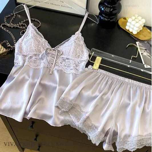 Conjunto de pijamas con tirantes para mujer, ropa de salón, lencería íntima de encaje calado Sexy, ropa de dormir, novedad de verano, Top y pantalones cortos con tirantes, ropa de casa
