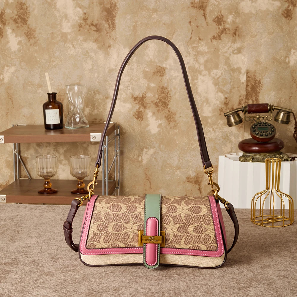 Bolso de mano para mujer 2026, nuevo diseño de nicho a la moda, bolso retro de hombro, ideal para el día a día, con bandolera de lujo ligero de alta gama.