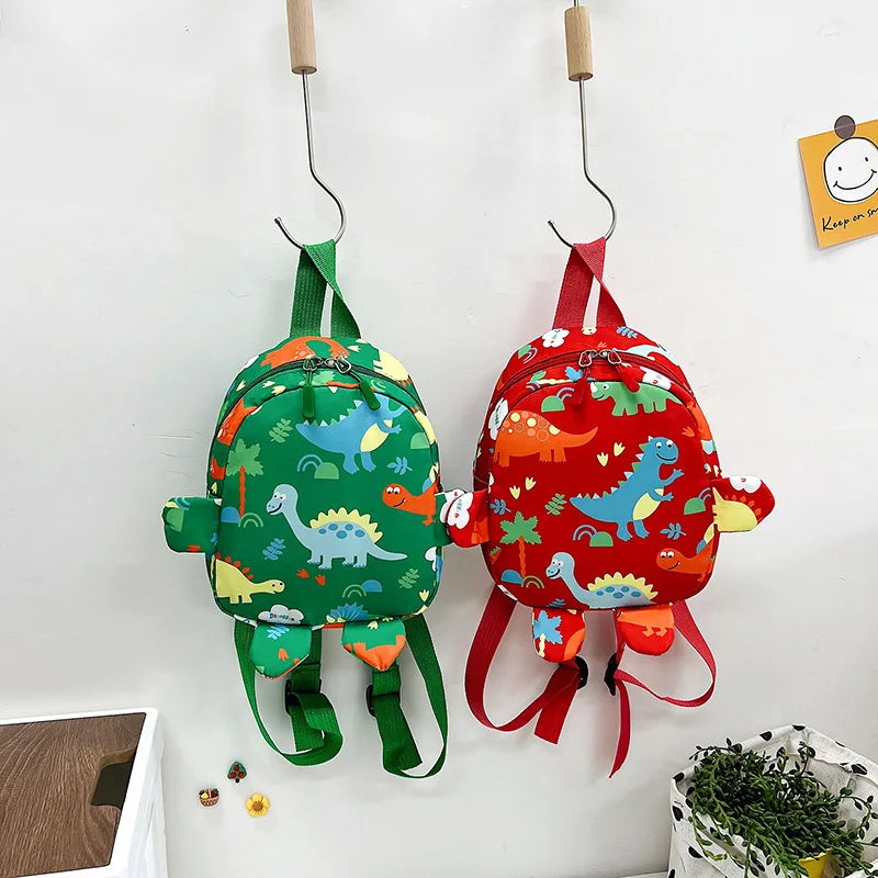 Bolsa bonita para niños, mochilas escolares con dibujos de dinosaurios para niños, mochila de viaje para exteriores preescolar para guardería, antipérdida