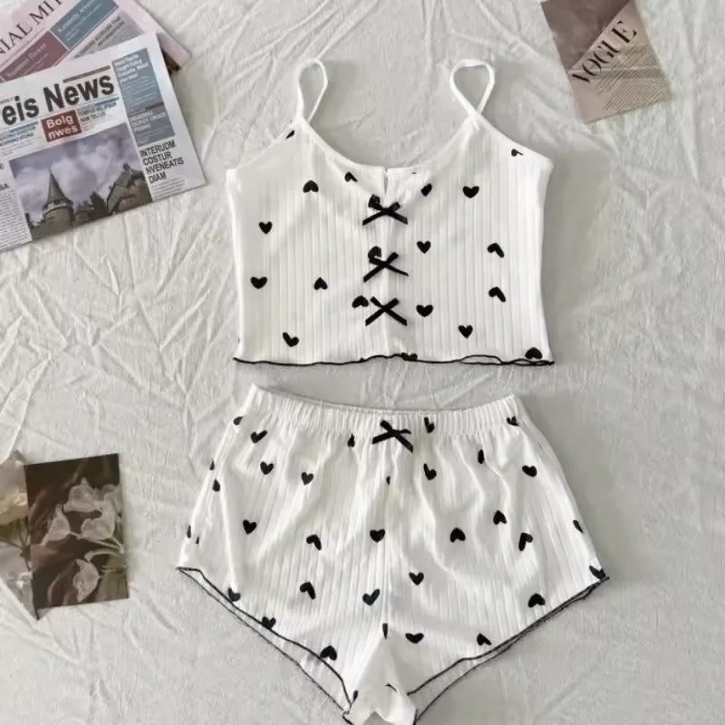 Ropa de dormir Sexy para mujer, conjunto de pijamas con estampado de corazón de seda, cuello en V, sin mangas, camisola informal, conjuntos de Top y pantalones cortos, traje para casa, ropa de descanso