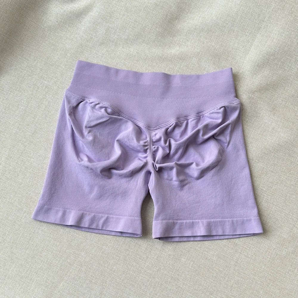 Pantalones cortos deportivos para mujer, pantalones cortos de gimnasio con banda baja acanalada de 4,5 ", mallas sin costuras para entrenamiento y Yoga