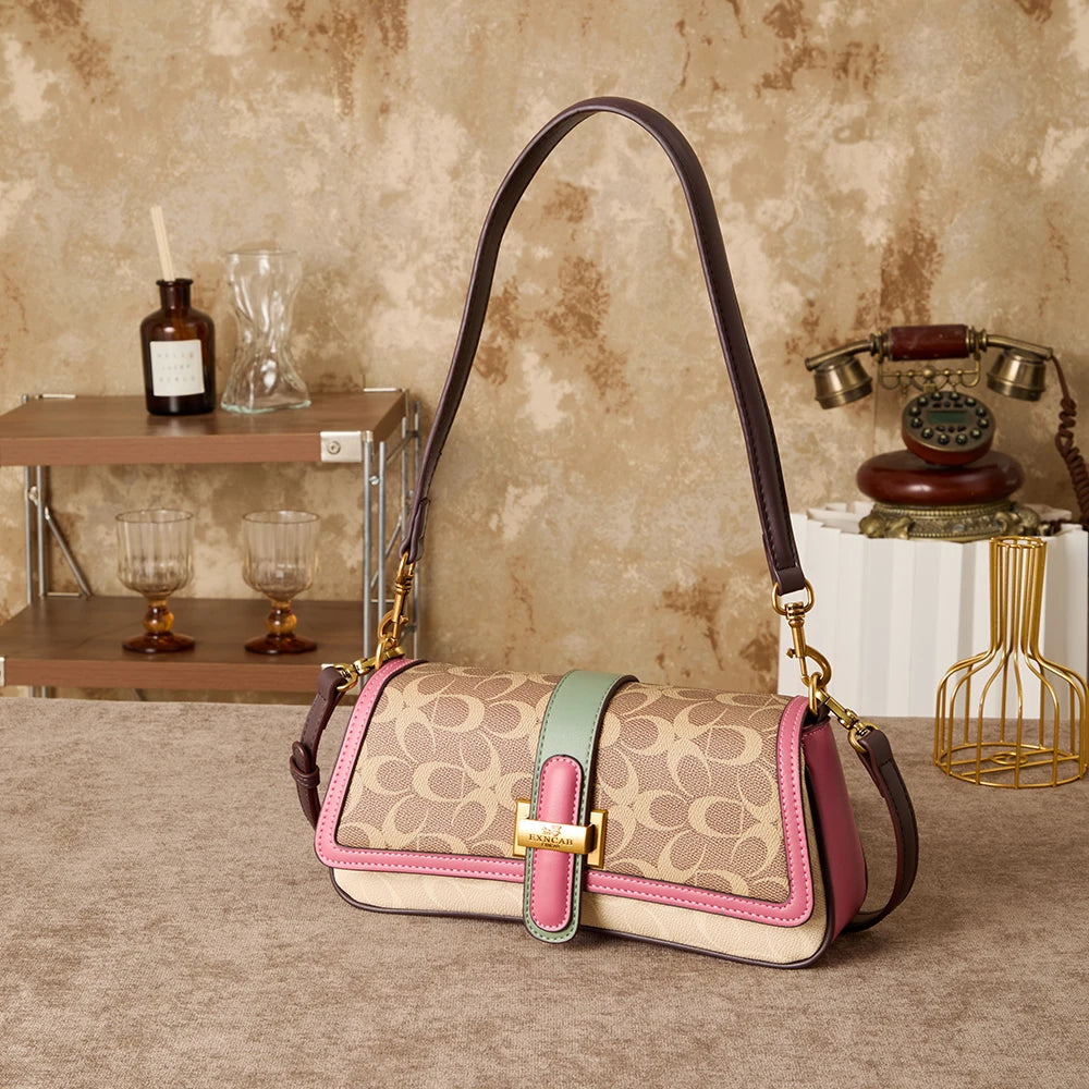 Bolso de mano para mujer 2026, nuevo diseño de nicho a la moda, bolso retro de hombro, ideal para el día a día, con bandolera de lujo ligero de alta gama.